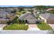 Inviting single-Gathering home with a pristine lawn, manicured landscaping, and a two-car garage at 123 Vitoria Rd, Davenport, FL 33837
