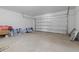 Spacious garage with a large overhead door and ample room for parking at 1251 Big Bass Dr, Ormond Beach, FL 32174