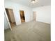 Carpeted bedroom with en-suite bathroom and closet at 12615 Salomon Cove, Windermere, FL 34786