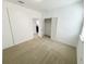 Bedroom with carpeted floors, closet and natural light at 12615 Salomon Cove, Windermere, FL 34786