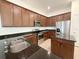 Kitchen with stainless appliances, center island and granite countertops at 12615 Salomon Cove, Windermere, FL 34786