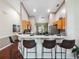 The kitchen has counter seating and flows into the dining area creating a great open space at 133 Hillcrest Dr, Davenport, FL 33897