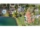 Waterfront property featuring lush landscaping at 1355 S Summerlin Ave, Orlando, FL 32806