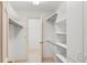 Walk-in closet with custom shelving and ample storage space at 1355 S Summerlin Ave, Orlando, FL 32806