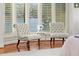 Close up of main bedroom sitting area with chairs and bay window at 1355 S Summerlin Ave, Orlando, FL 32806