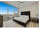 This is a primary bedroom with floor-to-ceiling windows that provide natural light and stunning city views at 150 E Robinson St # 2602, Orlando, FL 32801