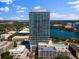 Exterior shot of the community, showcasing its high-rise architecture near a lake at 150 E Robinson St # 2602, Orlando, FL 32801