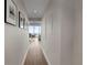 Hallway leading to dining area with modern decor and ample wall space at 150 E Robinson St # 2602, Orlando, FL 32801