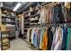 Large walk-in closet with custom shelving and ample storage space for clothes and accessories at 150 E Robinson St # 2602, Orlando, FL 32801