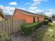 Fully fenced backyard with mature hedges providing plenty of privacy at 1727 Winter Green Blvd, Winter Park, FL 32792