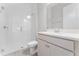 Bathroom with a glass enclosed shower and a vanity with a white countertop at 18955 Rawson St, Orlando, FL 32827