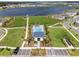 Beautiful aerial view of the community pool and clubhouse offering recreational opportunities at 18955 Rawson St, Orlando, FL 32827