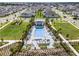 Aerial view of the community pool and lounge area; a perfect spot for relaxation and recreation at 18955 Rawson St, Orlando, FL 32827