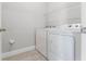 Practical laundry room with washer and dryer at 18955 Rawson St, Orlando, FL 32827