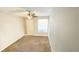 Bedroom with carpet and a ceiling fan at 1948 Lake Atriums Cir # 113, Orlando, FL 32839