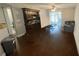 The living room is spacious with laminate floors and a sliding glass door at 1948 Lake Atriums Cir # 113, Orlando, FL 32839