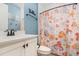 Upbeat bathroom with colorful shower curtain at 2032 Buckhanon Trl, Deland, FL 32720