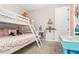 bedroom featuring bunkbeds and playful decor at 2032 Buckhanon Trl, Deland, FL 32720