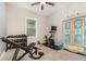 Bright exercise room with workout equipment and window at 2032 Buckhanon Trl, Deland, FL 32720