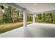 Covered patio with serene backyard view at 2121 5Th Ave, Deland, FL 32724