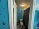 Bright bathroom with colorful walls, tile floors and tub/shower combo with decorative curtain at 2224 Patterson Ave, Orlando, FL 32811