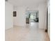 Hallway view showcasing tile floors and the seamless flow into the living area at 2321 Tay Wes Dr, St Cloud, FL 34771