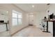 Bright living room featuring neutral paint colors, tile flooring, and lots of natural light at 2321 Tay Wes Dr, St Cloud, FL 34771