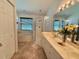 An updated bathroom with dual sinks and a glass-enclosed shower at 322 N Shadowbay Blvd, Longwood, FL 32779