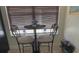 Cozy breakfast nook with comfortable seating next to large window with natural light at 322 N Shadowbay Blvd, Longwood, FL 32779
