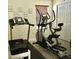 Well-equipped exercise room with treadmill and stationary bike for convenient at-home workouts at 322 N Shadowbay Blvd, Longwood, FL 32779