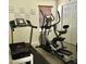 An in-home gym area with a treadmill and stationary bike at 322 N Shadowbay Blvd, Longwood, FL 32779