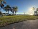 Lakeside recreation with grass, scenic views, benches, and water access for community activities and relaxation at 322 N Shadowbay Blvd, Longwood, FL 32779