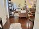 Cozy living room featuring hardwood floors, comfortable seating, and plenty of natural light at 322 N Shadowbay Blvd, Longwood, FL 32779