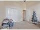 Well-sized bedroom with a closet, Christmas tree, and neutral paint color at 323 Villa Sorrento Cir, Haines City, FL 33844