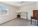 Bedroom featuring a window, ceiling fan, and furniture at 3262 Amaca Cir, Orlando, FL 32837