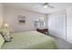 Bedroom featuring a window, ceiling fan, and furniture at 3262 Amaca Cir, Orlando, FL 32837