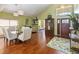 Dining room view into living room and foyer with vaulted ceiling at 3262 Amaca Cir, Orlando, FL 32837