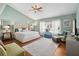 Relaxing main bedroom featuring a vaulted ceiling, a plush bed, and plenty of natural light at 3262 Amaca Cir, Orlando, FL 32837