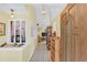 Welcoming foyer with neutral tile flooring and a view into the living spaces at 328 Bridle Path, Casselberry, FL 32707