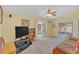 Comfortable living room with sliding glass doors leading to the outdoor area at 328 Bridle Path, Casselberry, FL 32707