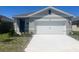 Charming single-story home with a two-car garage and well-maintained lawn at 3623 Marlbrry Way, Sanford, FL 32773