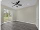 Bedroom featuring a sliding glass door leading to the backyard at 3778 Martin St, Orlando, FL 32806