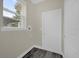 Cozy laundry room with a window and modern floors at 3778 Martin St, Orlando, FL 32806