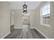 Open floorplan featuring stylish lighting and durable floors at 3778 Martin St, Orlando, FL 32806