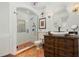 Charming bathroom featuring a vanity style sink and a glass enclosed tile shower at 400 W Par St, Orlando, FL 32804