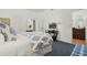 Comfortable bedroom with white walls, blue carpet, and access to the en-suite bathroom at 400 W Par St, Orlando, FL 32804