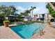 Lovely pool features mature trees and lawn at 400 W Par St, Orlando, FL 32804