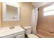 This bathroom features a white sink and vanity, a standard toilet, and a shower/tub with a curtain at 4309 Enright Ct, Winter Park, FL 32792