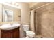 Bathroom featuring stylish tile shower and wood vanity sink at 4309 Enright Ct, Winter Park, FL 32792