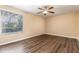 Bedroom with large window and ceiling fan at 4309 Enright Ct, Winter Park, FL 32792